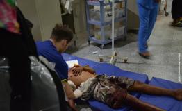 A doctor tends to a patient in Aden, Yemen, 1 August 2019.