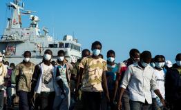 Migrants, asylum seekers and refugees mainly from Eritrea and Gambia land a few hours after being rescued from the sea.