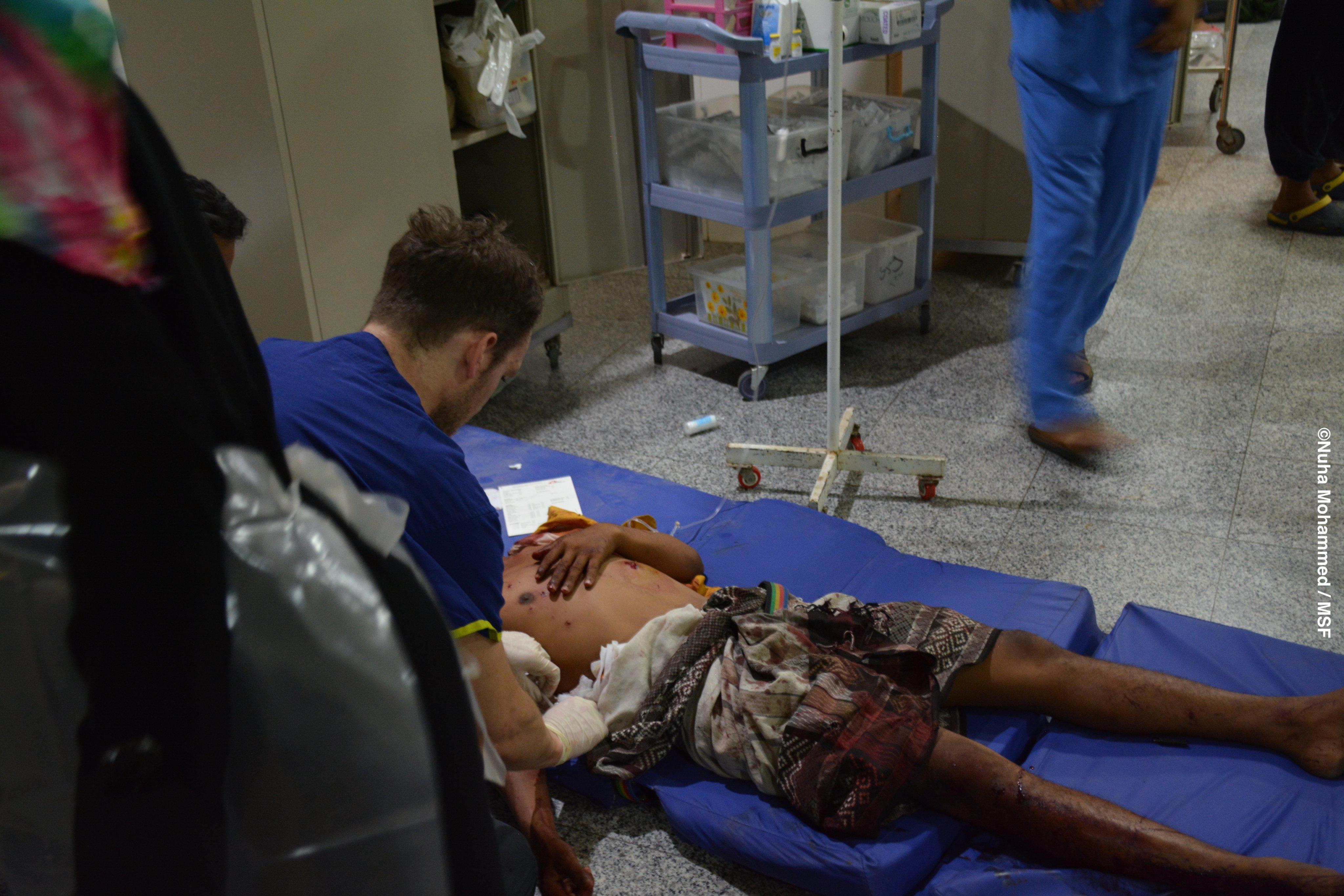 A doctor tends to a patient in Aden, Yemen, 1 August 2019.